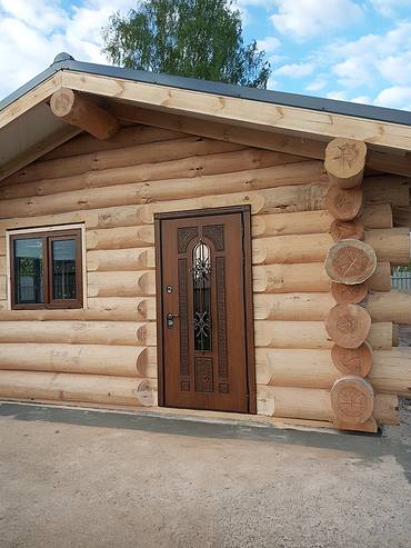 Утепленная дверь с ковкой